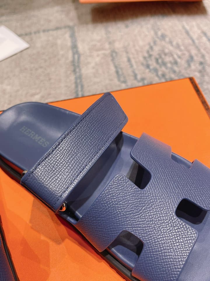 Hermès Chypre Suede Unisex Slides in Black With Dark Blue Strap