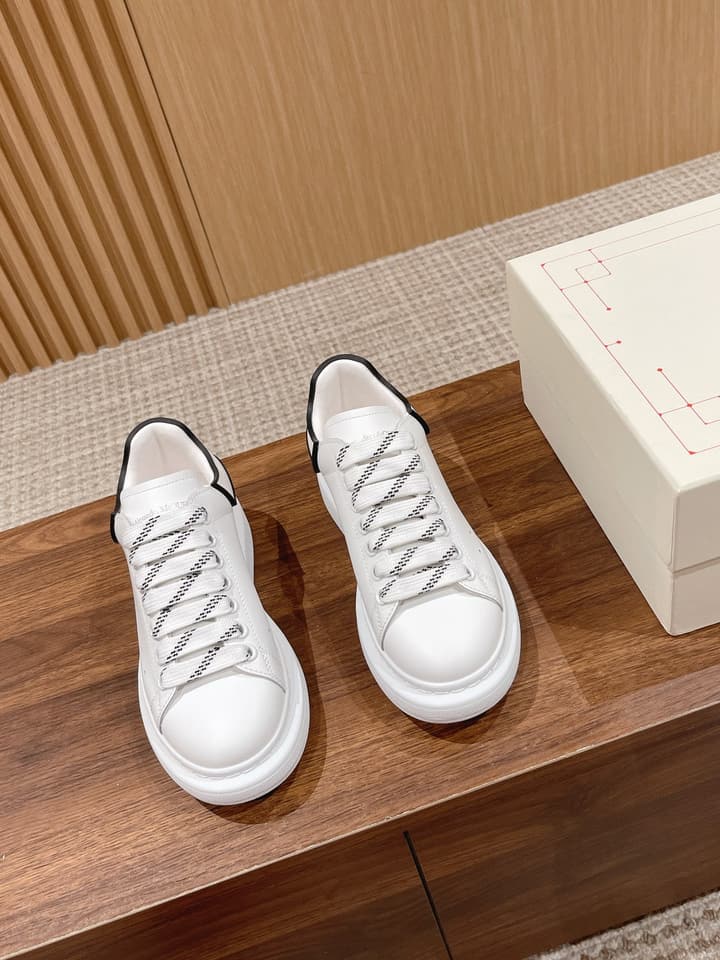 Alexander McQueen Classic Versatile White Sneakers in White With Black Laces & Heel