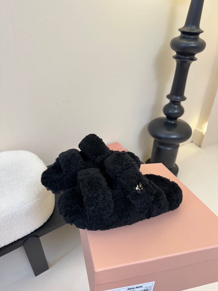 Miu Miu Sheepskin Mules in Black