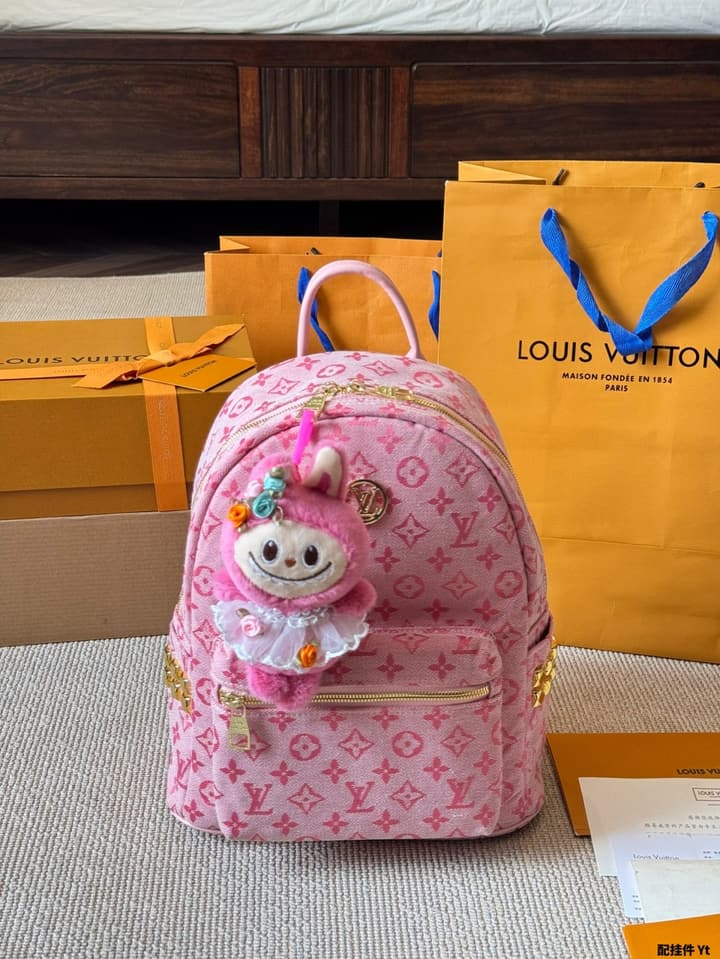 Louis Vuitton Monogram Mini Backpack in Monogram With Light Blue Charm