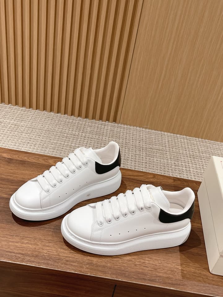 Alexander McQueen Classic Versatile White Sneakers in White With Black Laces & Heel