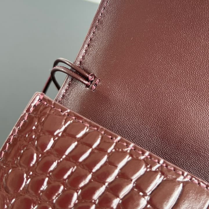 Bottega Veneta Crocodile Embossed Intrecciato Clutch in Gold