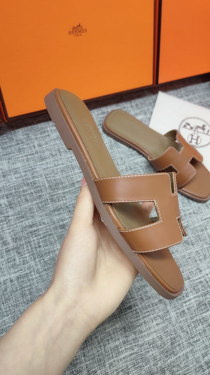 Hermès Premium Leather Flat Slides – 2024 Collection