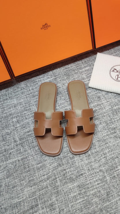 Hermès Premium Leather Flat Slides – 2024 Collection