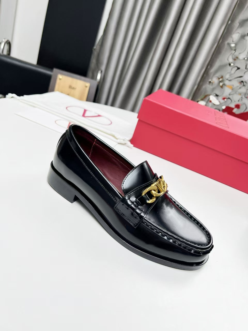 Valentino Logo Buckle Polished Leather Loafers – 2024 Collection