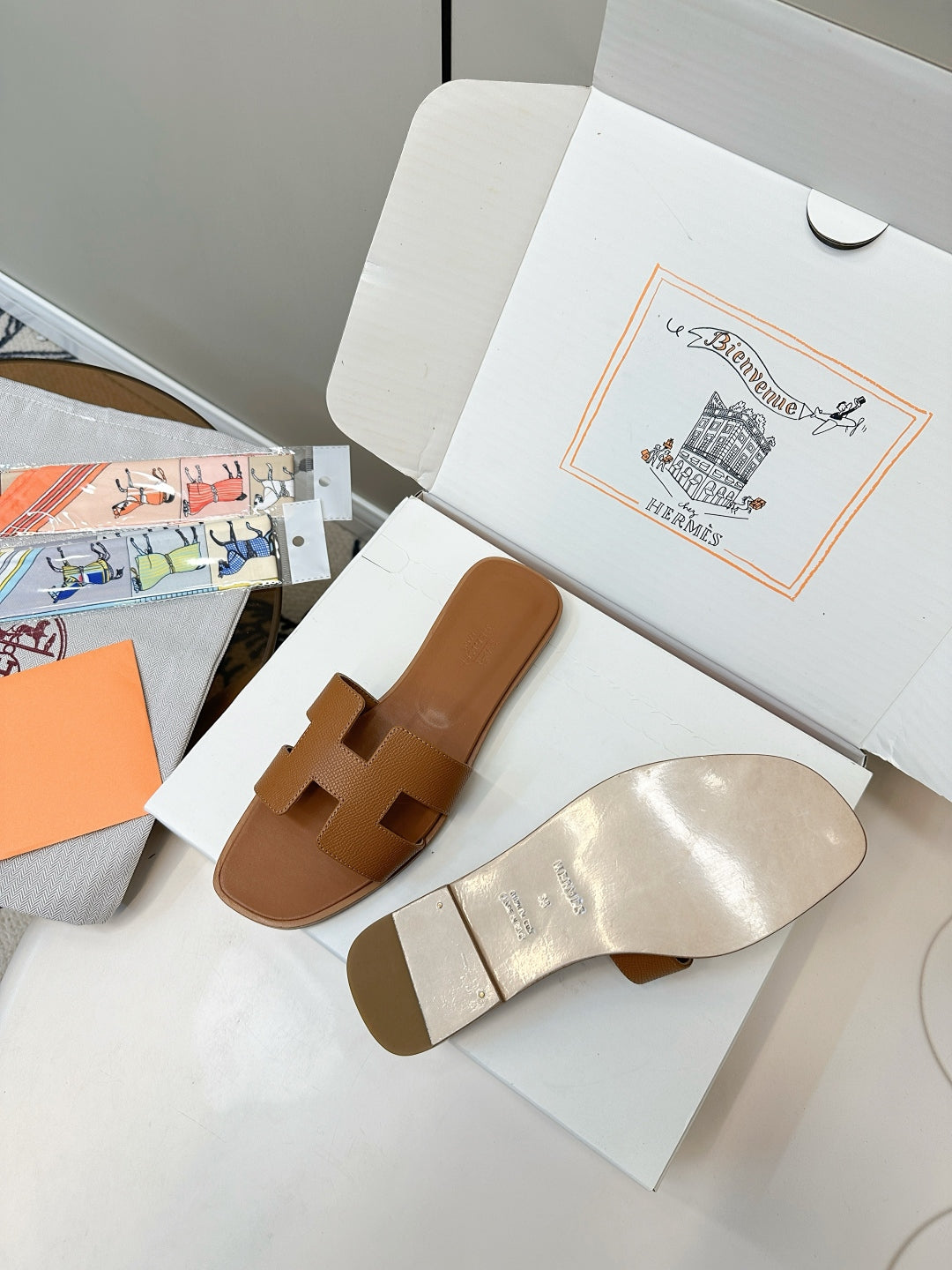 Hermès Fashion Palm-Grain H Slides