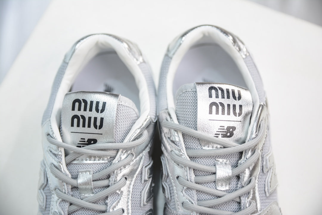 Miu Miu x New Balance MR530 SL Distressed Sneakers