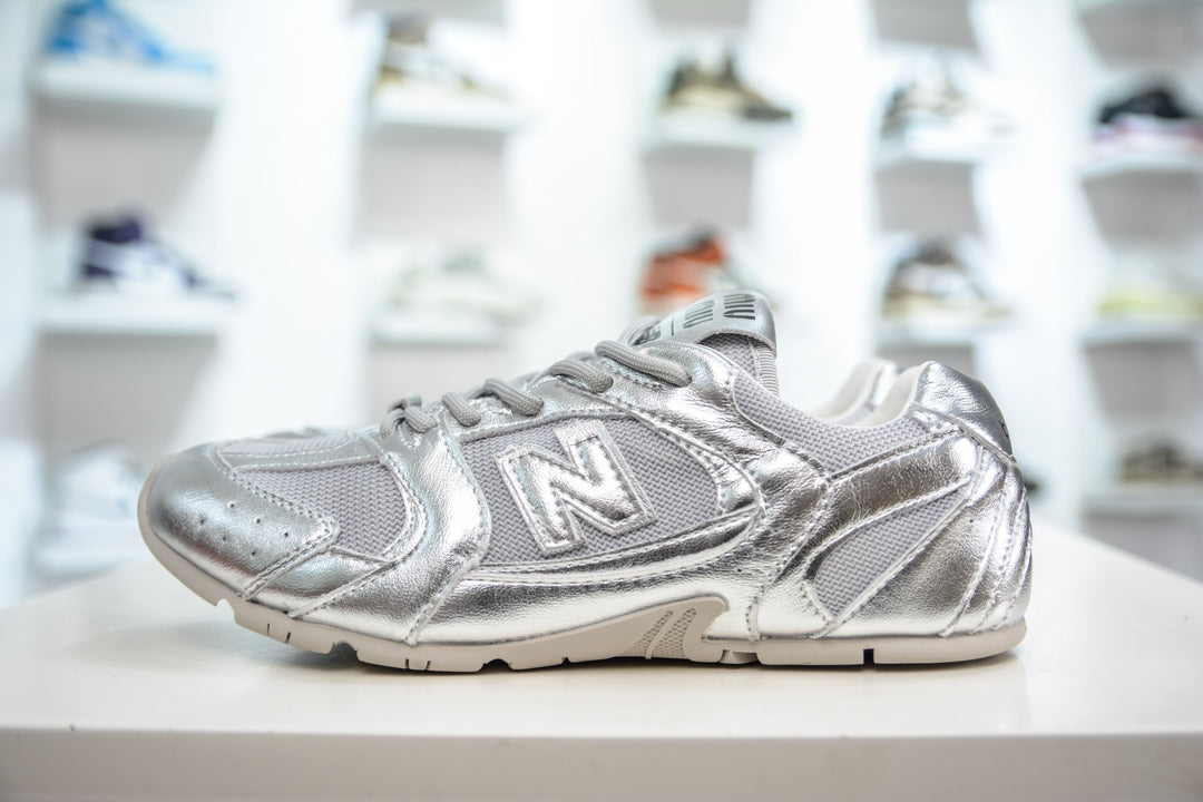 Miu Miu x New Balance MR530 SL Distressed Sneakers