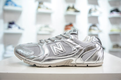 Miu Miu x New Balance MR530 SL Distressed Sneakers