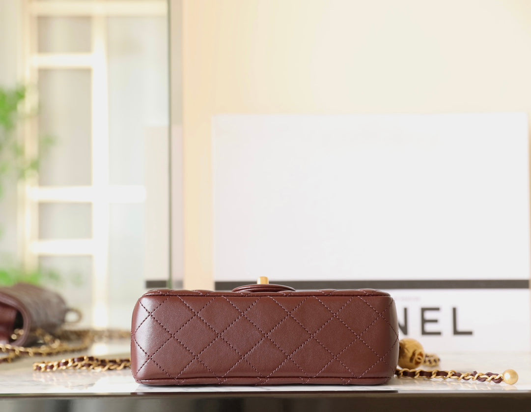 Chanel Gold Ball Mini Flap Bag