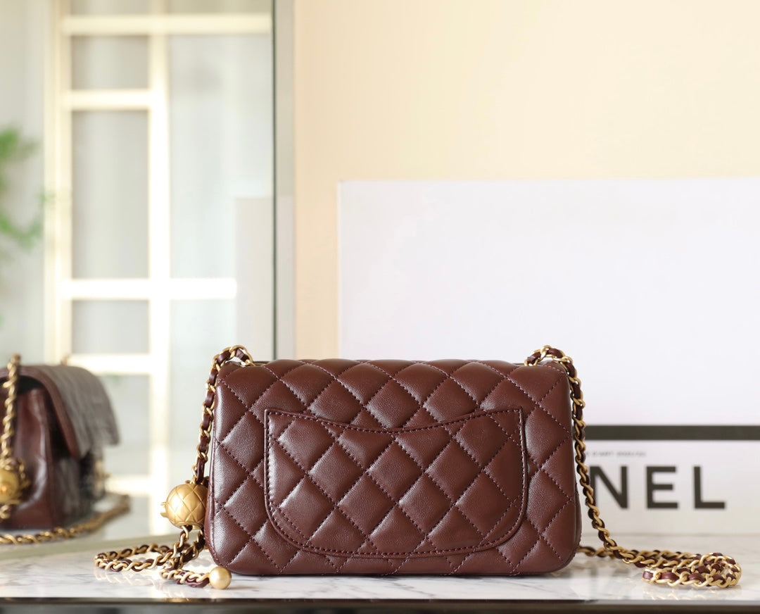 Chanel Gold Ball Mini Flap Bag