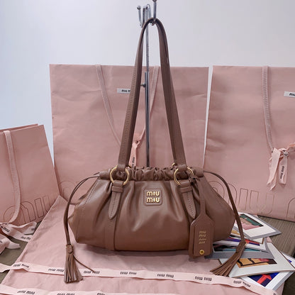Miu Miu Tassel Drawstring Bucket Bag – New Collection