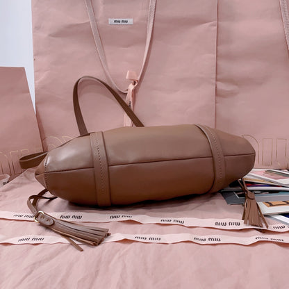 Miu Miu Tassel Drawstring Bucket Bag – New Collection