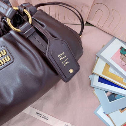 Miu Miu Tassel Drawstring Bucket Bag – New Collection