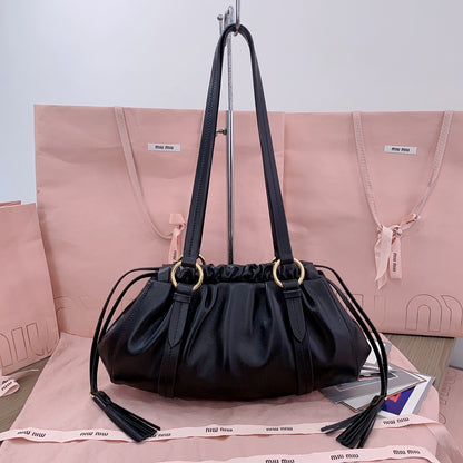 Miu Miu Tassel Drawstring Bucket Bag – New Collection