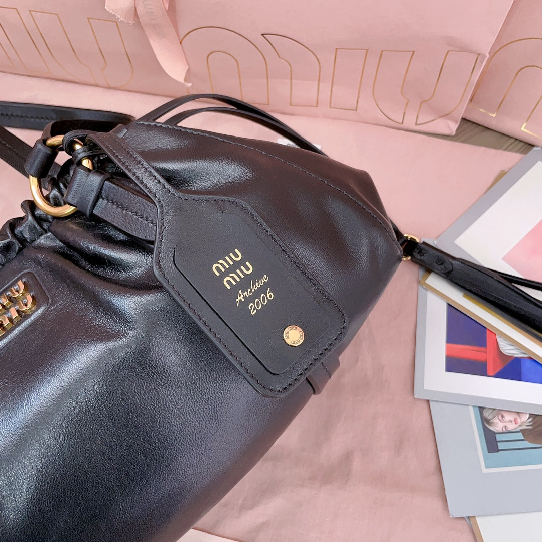 Miu Miu Tassel Drawstring Bucket Bag – New Collection