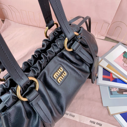 Miu Miu Tassel Drawstring Bucket Bag – New Collection