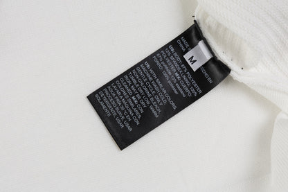Hermès Retro Knitted Polo Shirt – SS24