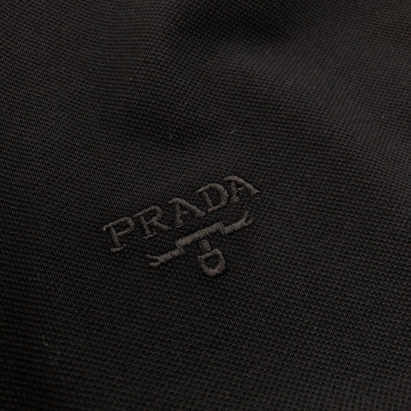 Prada Embroidered Triangle Logo Polo Shirt – 2026SS