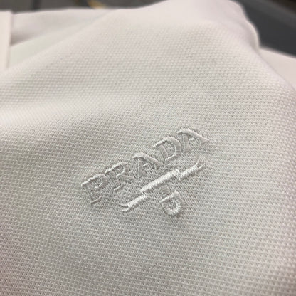 Prada Embroidered Triangle Logo Polo Shirt – 2026SS