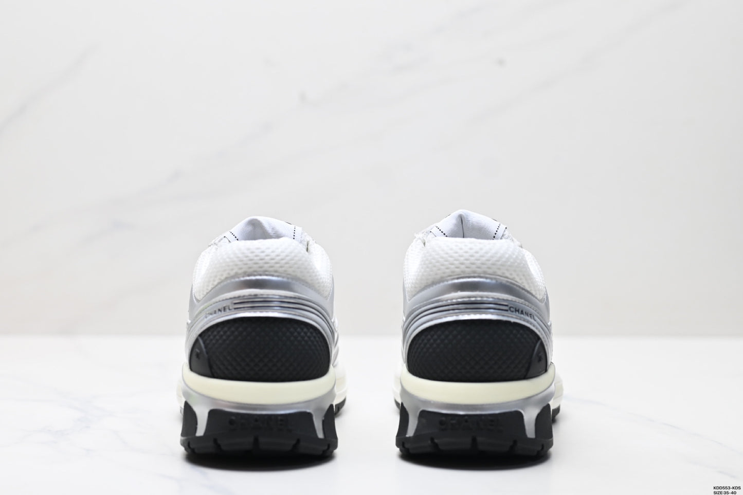 Chanel Leather Logo Low-Top Sneakers