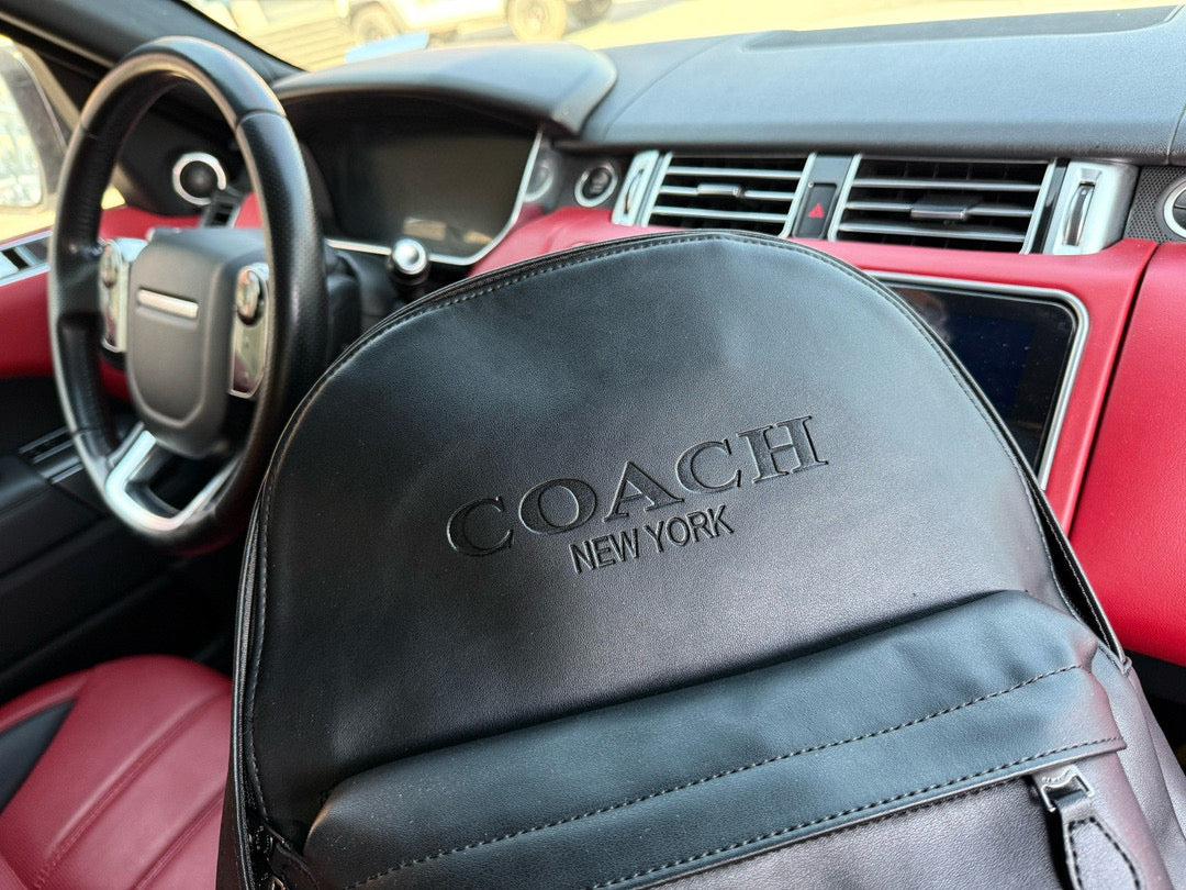 Coach Charles 35 Logo-Embossed Leather Backpack