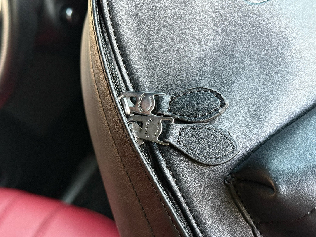 Coach Charles 35 Logo-Embossed Leather Backpack