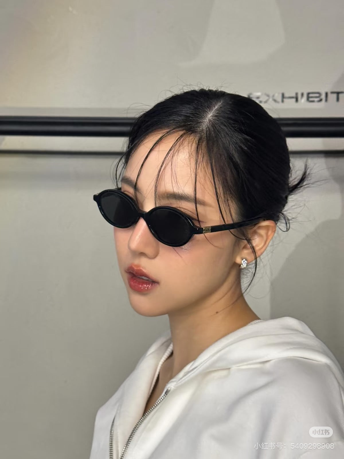 Miu Miu Retro Oval Sunglasses