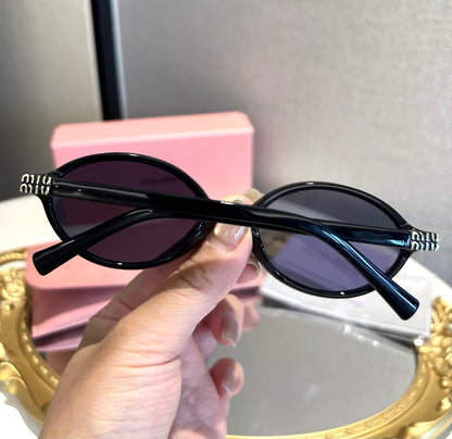 Miu Miu Retro Oval Sunglasses