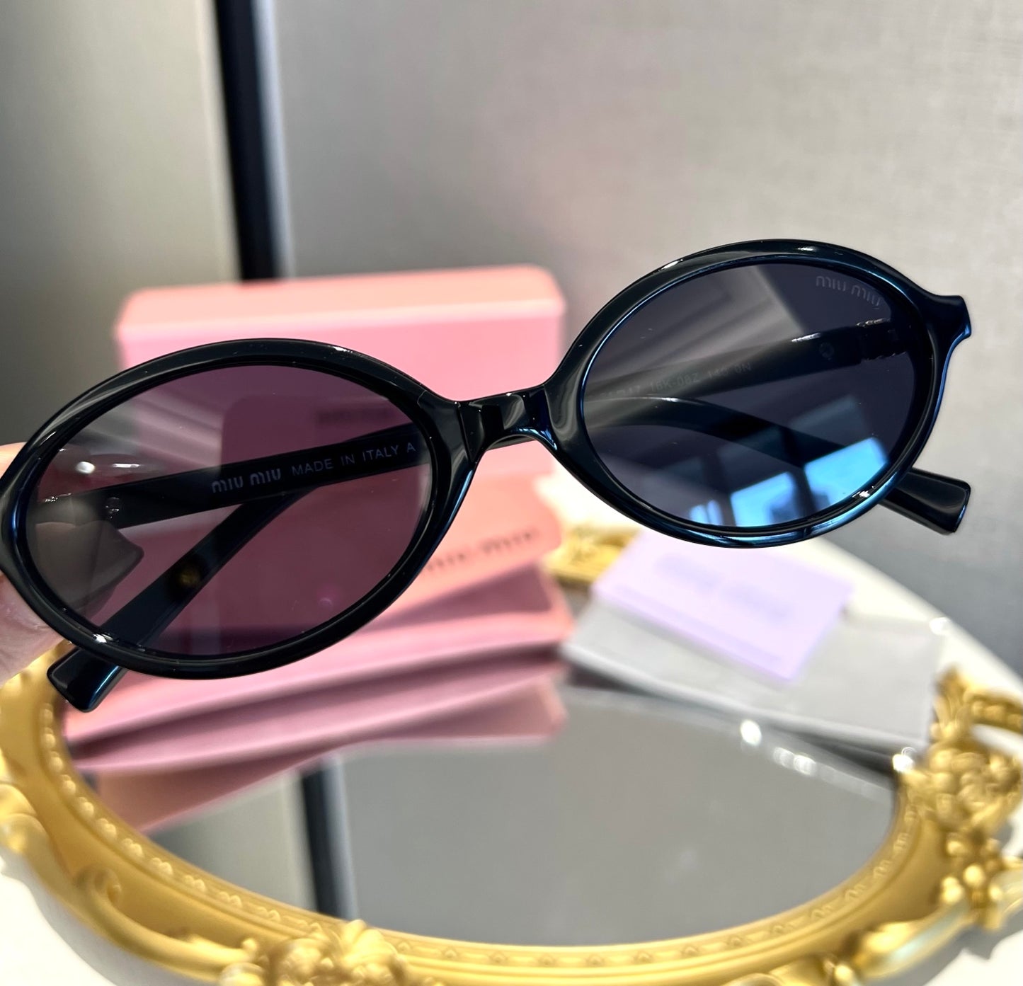 Miu Miu Retro Oval Sunglasses