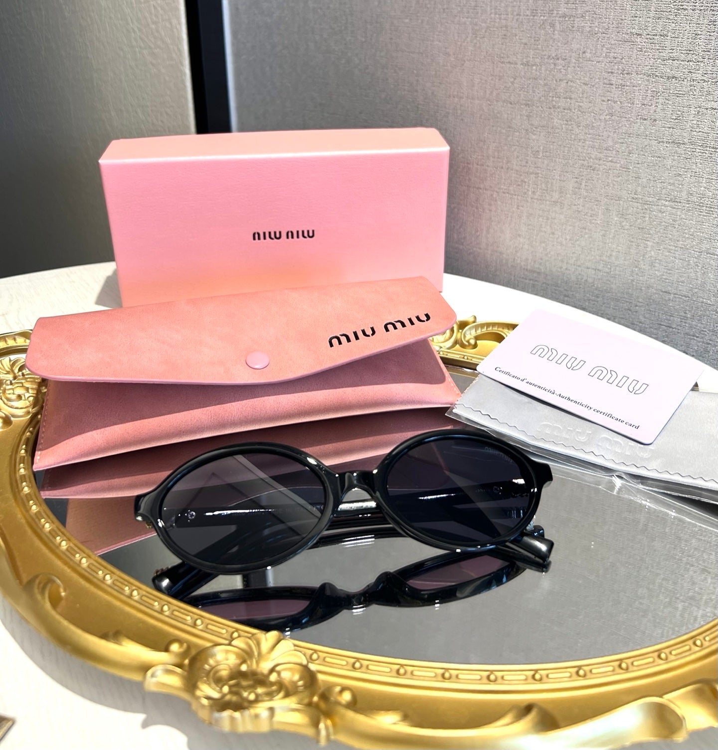 Miu Miu Retro Oval Sunglasses