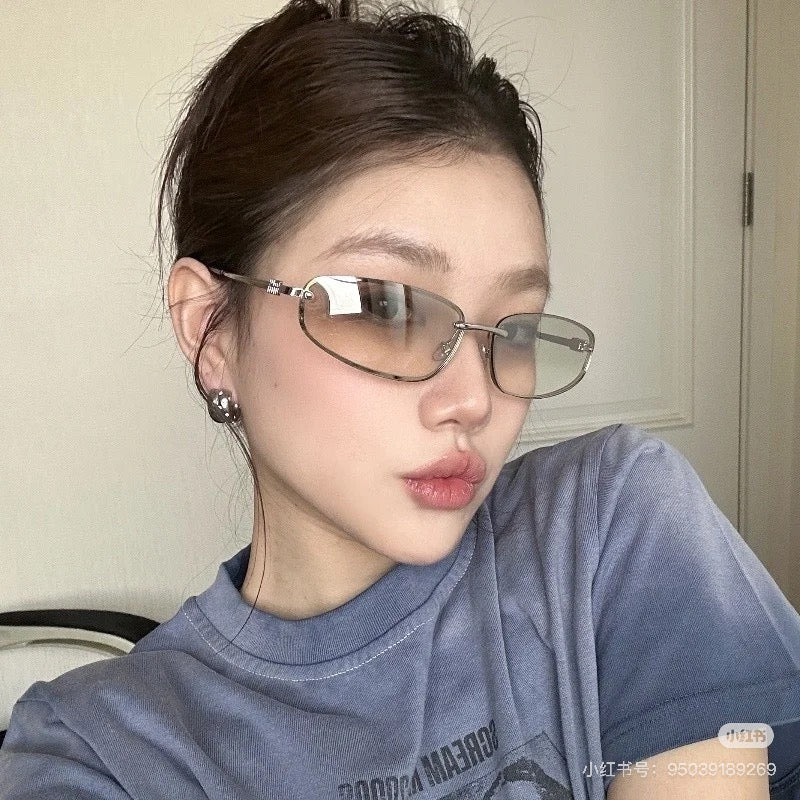 Miu Miu A50 Futuristic Cat-Eye Sunglasses – 25SS