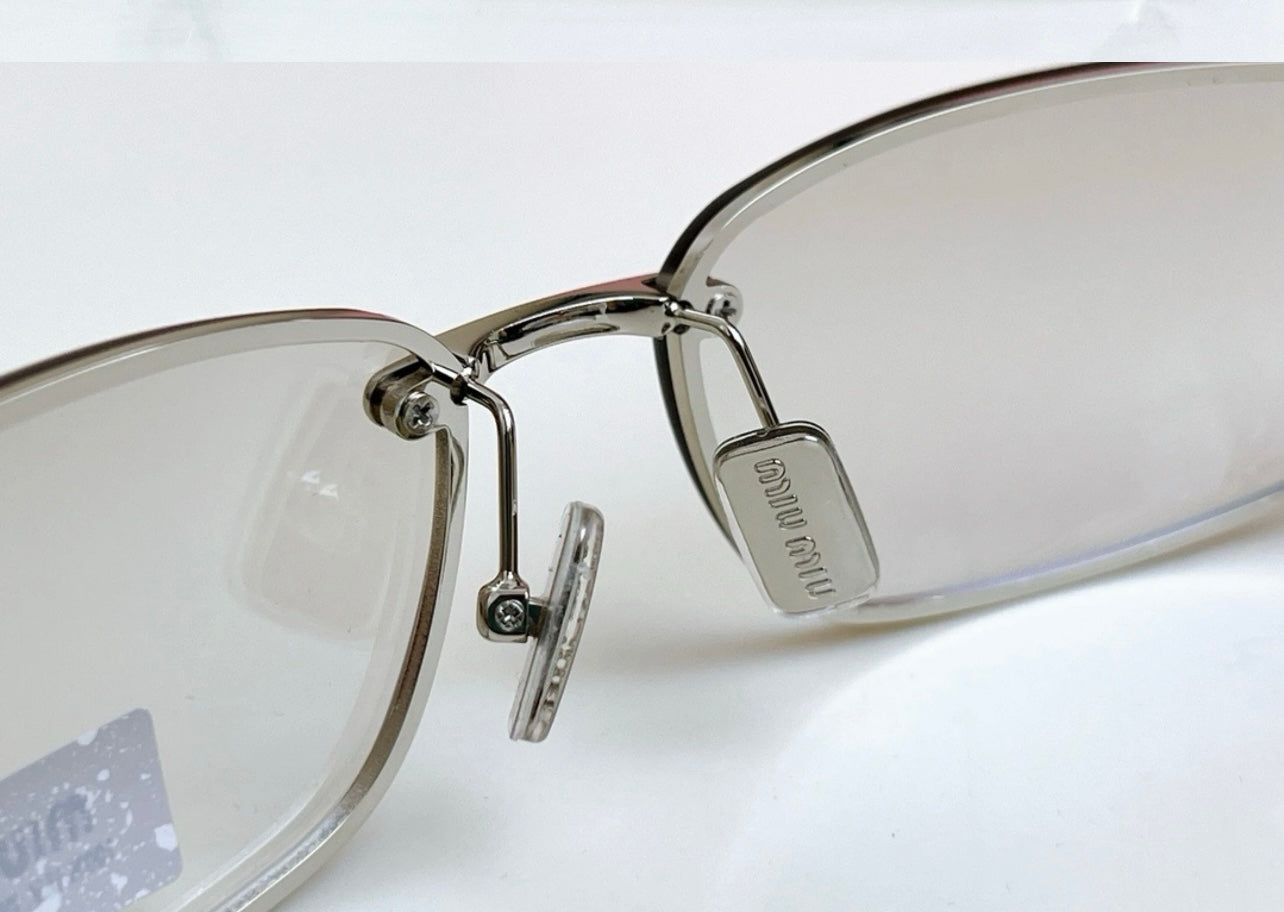 Miu Miu A50 Futuristic Cat-Eye Sunglasses – 25SS