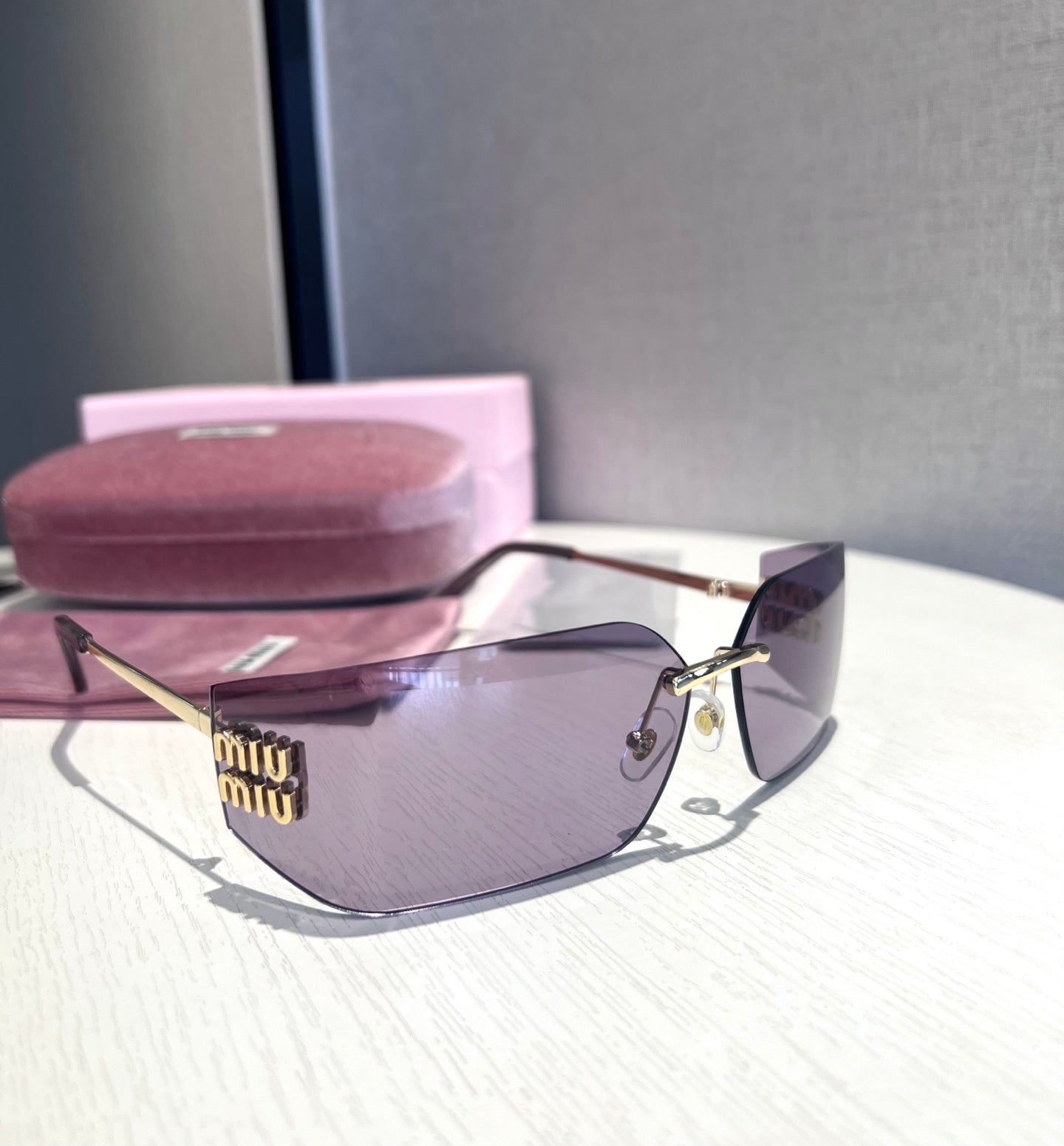 Miu Miu 54Y Runway Rimless Sunglasses