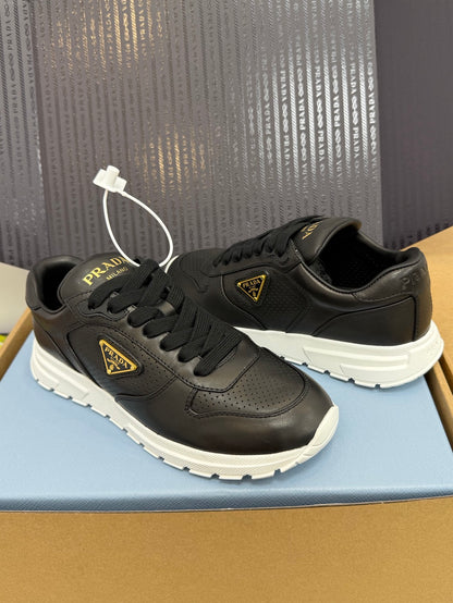 Prada Triangle Logo Sporty Sneakers – 2025 Early Autumn Collection