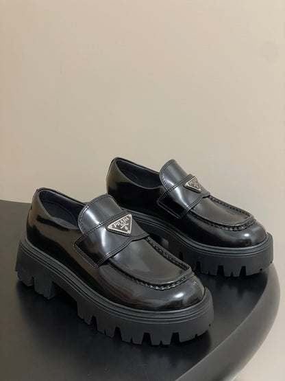 Prada Thick-Soled Platform Loafers – 25FW
