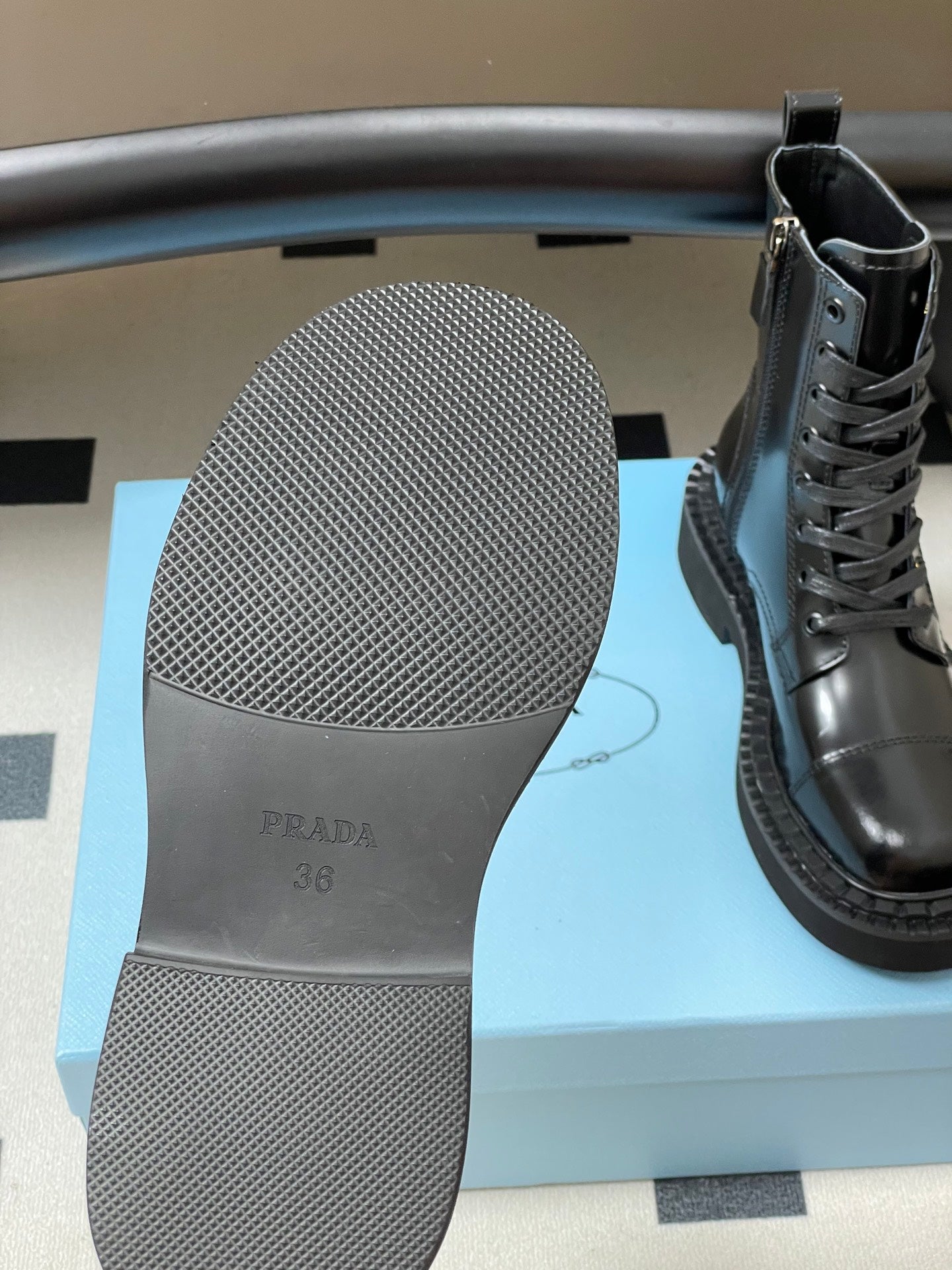 Prada Triangle Logo Combat Boots – 25SS