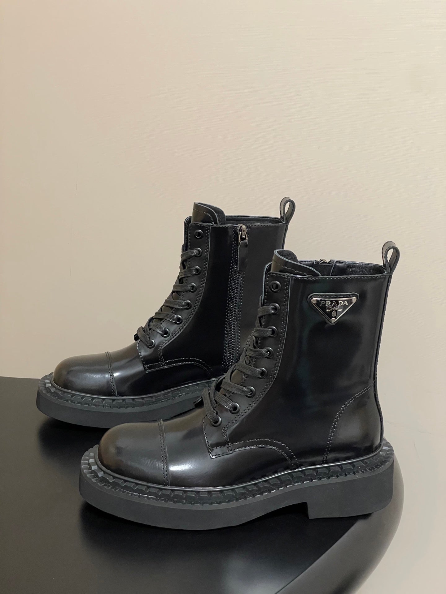 Prada Triangle Logo Combat Boots – 25SS