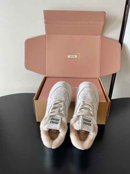 Miu Miu Distressed Retro German Training Sneakers