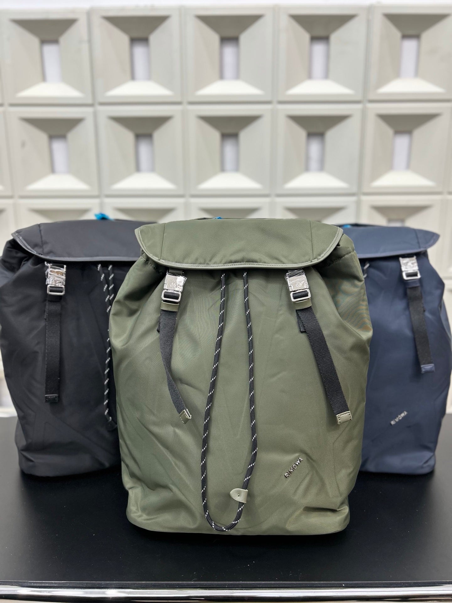 RIMOWA Signature Series Flap Drawstring Backpack