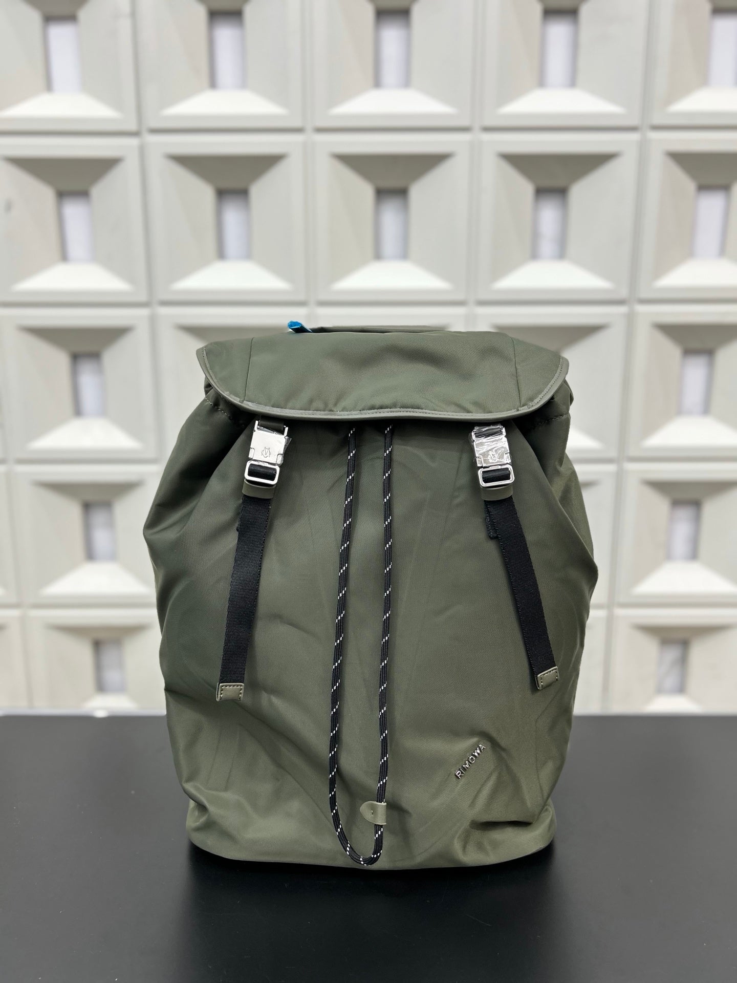 RIMOWA Signature Series Flap Drawstring Backpack