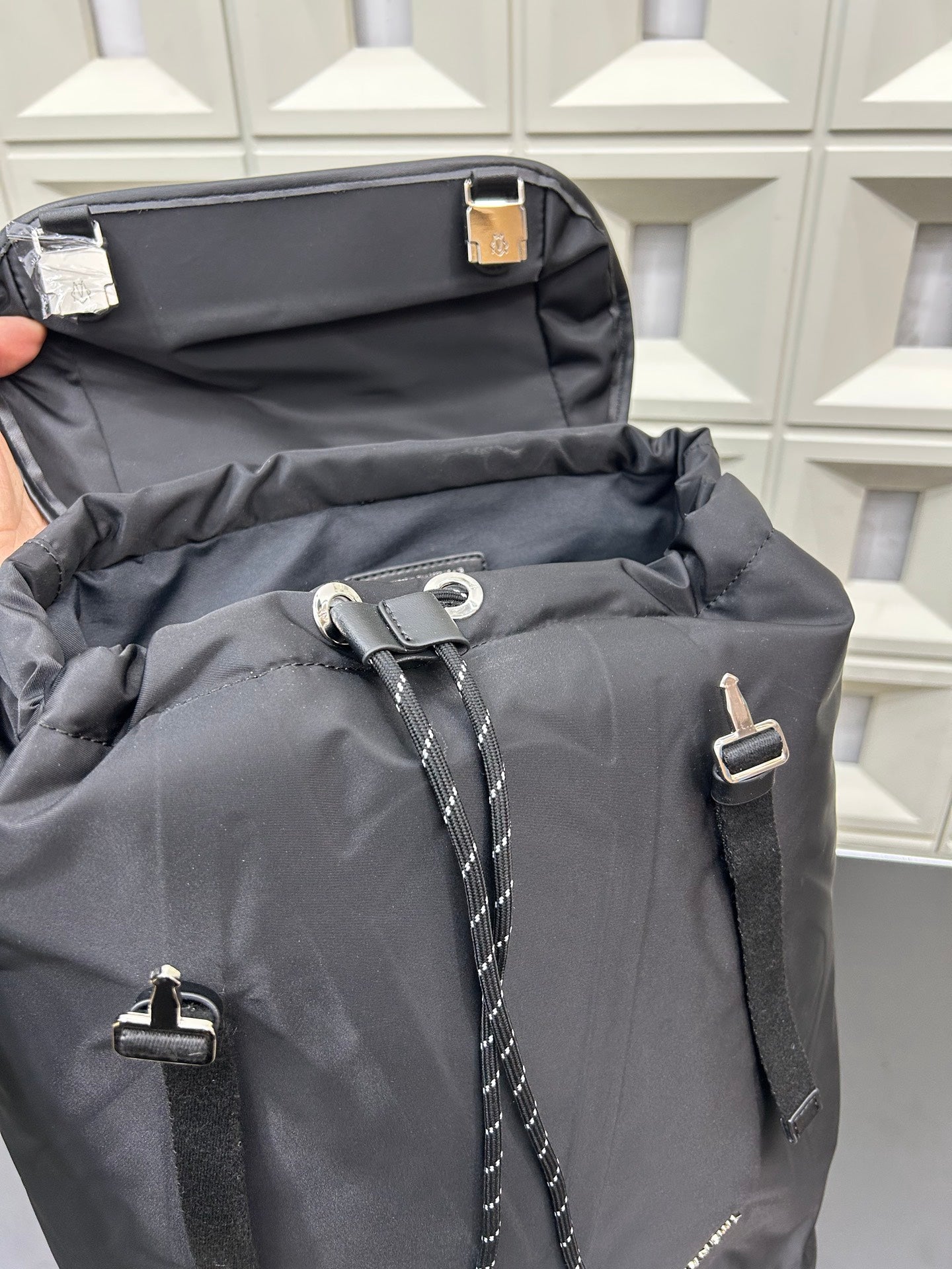 RIMOWA Signature Series Flap Drawstring Backpack