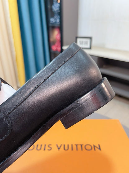 Louis Vuitton Embossed Leather Loafers