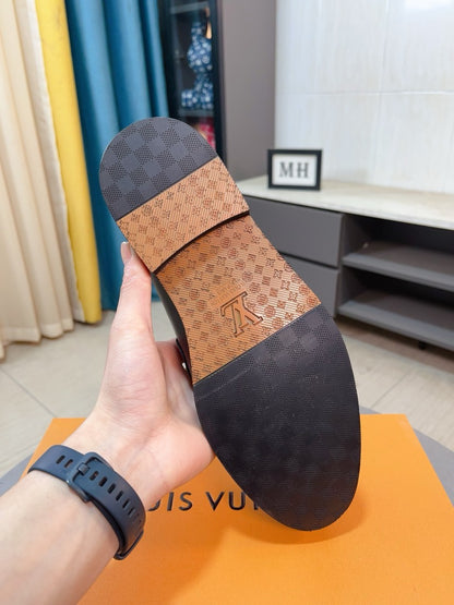 Louis Vuitton Embossed Leather Loafers