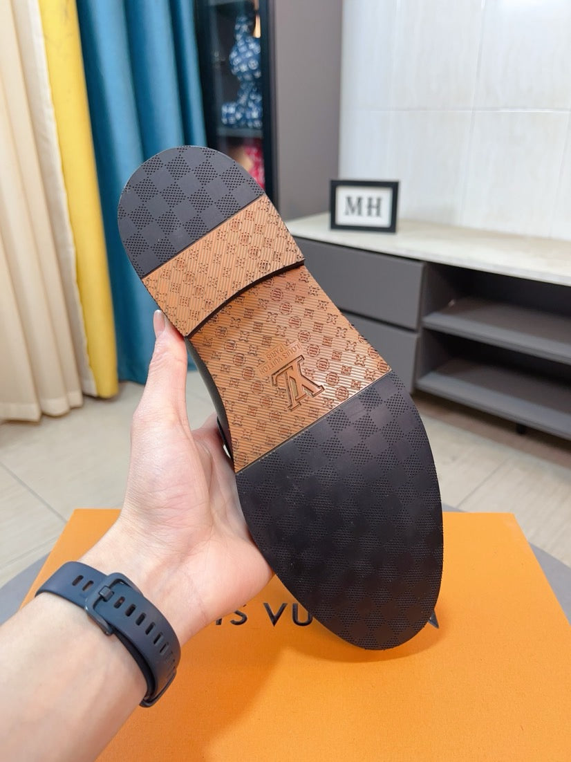 Louis Vuitton Embossed Leather Loafers