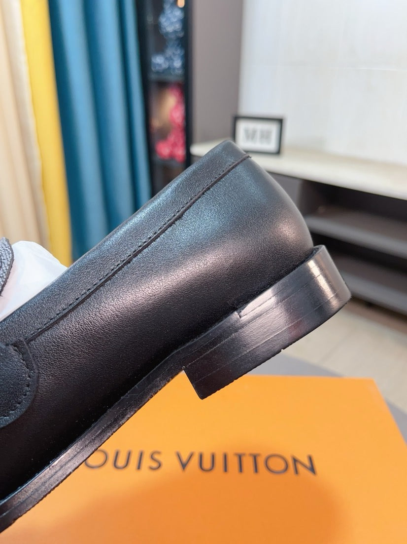 Louis Vuitton Embossed Leather Loafers