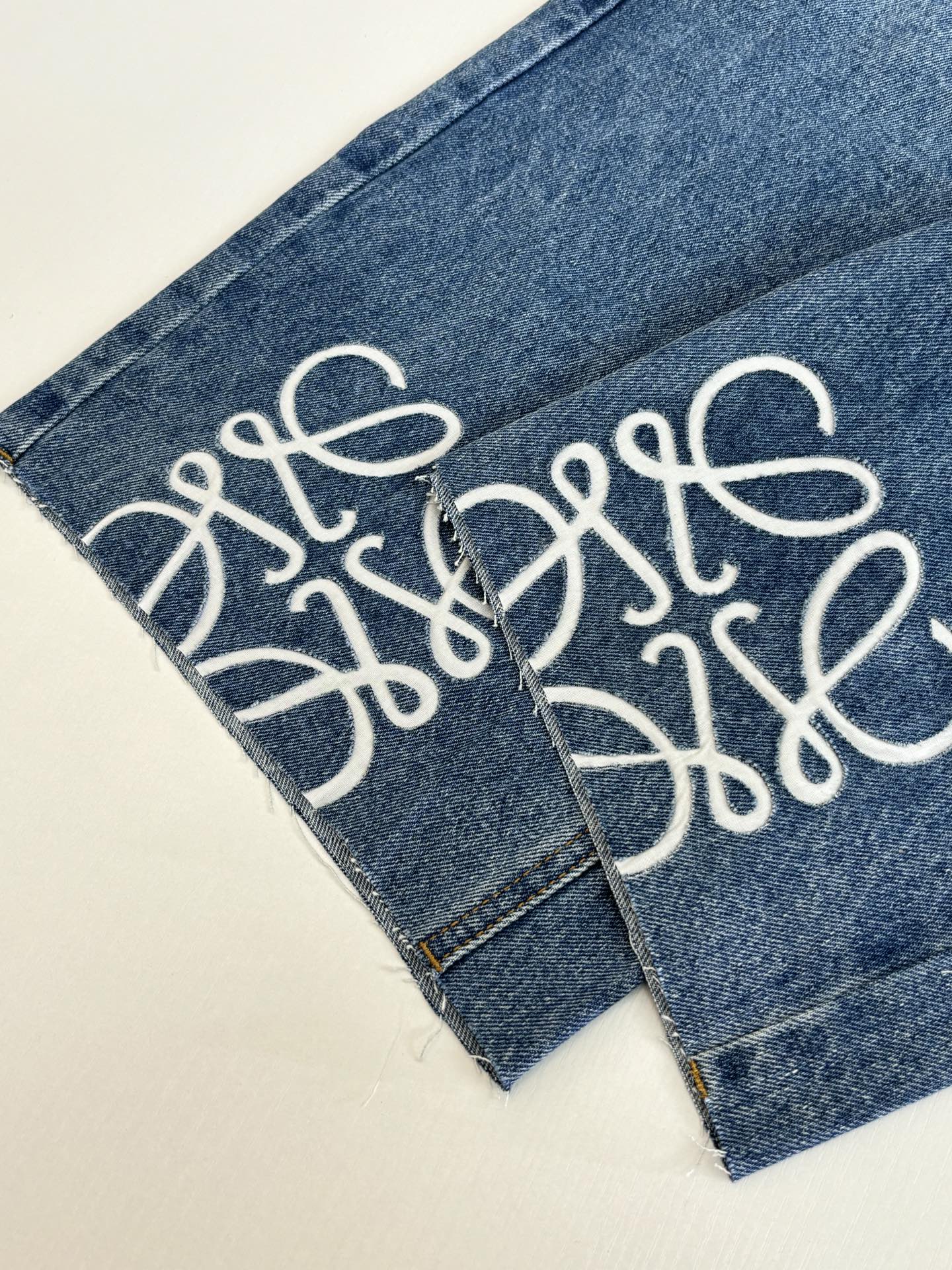 Loewe Anagram Laser-Cut Denim Shorts