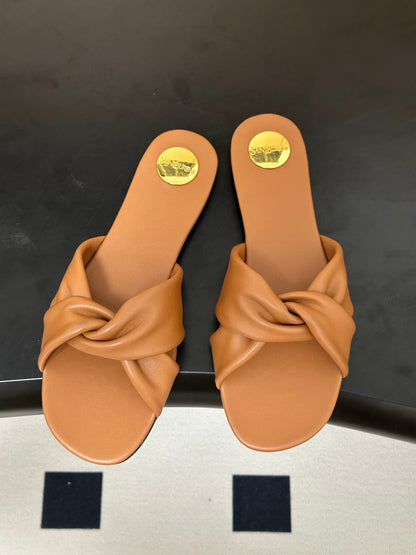 Saint Laurent Cross-Knot Leather Mules – Spring/Summer Collection – 26S