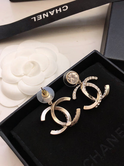 Chanel Twisted CC Diamond Earrings