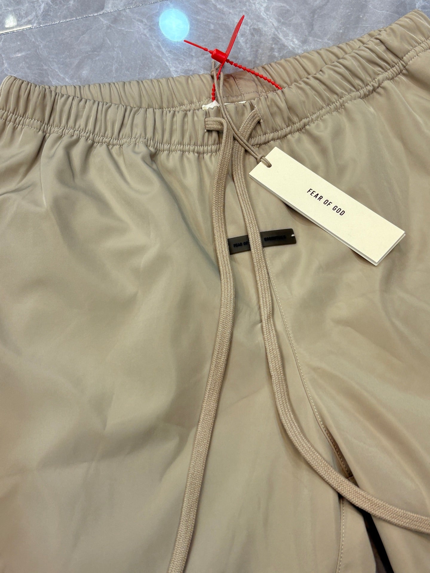 Fear of God ESSENTIALS Letter Logo Woven Shorts